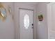 Elegant front door with decorative glass panel and welcoming decor at 1004 Osage St, Clearwater, FL 33755