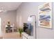 Open concept living area with dining, and large painting at 1004 Osage St, Clearwater, FL 33755