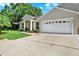 Charming single-Gathering home with a well-manicured lawn and an attached two-car garage at 10597 Alvarado Ct, Seminole, FL 33772