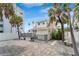 A fenced backyard offers a private deck and access to the garage and additional apartment at 108 5Th Ave, St Pete Beach, FL 33706