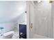 Bathroom featuring a glass enclosed shower, marble vanity, and bright natural light at 108 5Th Ave, St Pete Beach, FL 33706