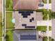 Aerial view showcasing solar panels on a roof and a pool in the backyard at 11024 Purple Martin Blvd, Riverview, FL 33579
