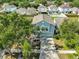 A two-story home with a light-blue exterior and a front yard at 11438 Ivy Flower Loop, Riverview, FL 33578