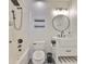 Stylish bathroom featuring modern fixtures, including a rainfall shower head and patterned flooring at 11438 Ivy Flower Loop, Riverview, FL 33578