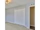 A view of a bedroom with neutral paint, carpet, and closet at 11438 Ivy Flower Loop, Riverview, FL 33578