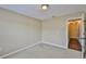 This bedroom has carpet and an open doorway at 11438 Ivy Flower Loop, Riverview, FL 33578