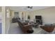 A beautifully decorated living room with contemporary furniture, neutral tones, and stylish decor at 11438 Ivy Flower Loop, Riverview, FL 33578