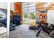 Spacious garage featuring an open overhead door, and plenty of room for storage at 11945 Darwin Ave, New Port Richey, FL 34654
