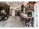 Large garage with ample workspace, tool storage, and concrete flooring at 11945 Darwin Ave, New Port Richey, FL 34654