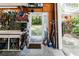 Garage with ample storage, workshop space, and access to outdoor area at 11945 Darwin Ave, New Port Richey, FL 34654