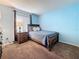Comfortable main bedroom featuring natural light from the window at 1207 Pine Ridge W Cir # H2, Tarpon Springs, FL 34688