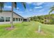 Beautiful backyard overlooking the water and lush Florida landscape at 123 Glendower Cir # 123, Sun City Center, FL 33573