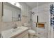 The bathroom features a shower with safety bars and a vanity sink at 123 Glendower Cir # 123, Sun City Center, FL 33573