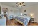 This bedroom offers hard floors and large closet space, as well as room for storage at 123 Glendower Cir # 123, Sun City Center, FL 33573