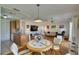 Spacious and open floor plan combining the kitchen, dining area, and living room areas of the home at 123 Glendower Cir # 123, Sun City Center, FL 33573