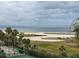 Aerial view of beach access by boardwalk to enjoy the ocean and coastline at 1230 Gulf Blvd # 601, Clearwater Beach, FL 33767