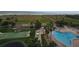 Aerial view showcasing the pool, shuffleboard, and beach access for the community at 1230 Gulf Blvd # 601, Clearwater Beach, FL 33767