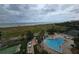Aerial view of the pool and beach access that this lovely community offers its residents at 1230 Gulf Blvd # 601, Clearwater Beach, FL 33767