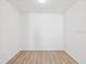 Bright bedroom featuring wood floors and neutral paint, creating a blank canvas at 1325 Custer Bayou St, Ruskin, FL 33570
