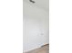 Bright bedroom features a white wall and neutral flooring, ready for personalization at 1325 Custer Bayou St, Ruskin, FL 33570