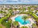 Beautiful community pool and lush landscaping, perfect for relaxing and enjoying the Florida sunshine at 1325 Custer Bayou St, Ruskin, FL 33570