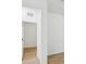 Hallway leading to the bedroom offers easy access and flow within the home at 1325 Custer Bayou St, Ruskin, FL 33570