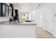 Updated kitchen with dark cabinetry, stainless appliances, and an island with bar seating at 1325 Custer Bayou St, Ruskin, FL 33570