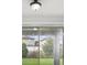 Sliding glass doors lead to a patio, offering seamless indoor-outdoor living at 1325 Custer Bayou St, Ruskin, FL 33570