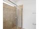 A new bathroom features a glass-enclosed shower at 1325 Custer Bayou St, Ruskin, FL 33570