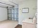 Garage area featuring a laundry area with washer and dryer, sink, and garage door at 14230 86Th Ter, Seminole, FL 33776