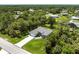 A high angle aerial shows the location of the home within its neighborhood at 14422 Chamberlain Blvd, Port Charlotte, FL 33953