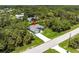 A high angle aerial shows the location of the home within its neighborhood at 14422 Chamberlain Blvd, Port Charlotte, FL 33953