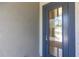 Front door with rectangular design and a modern handle at 14422 Chamberlain Blvd, Port Charlotte, FL 33953
