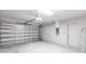 Spacious two-car garage with ample storage and an automatic door at 14422 Chamberlain Blvd, Port Charlotte, FL 33953