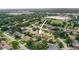 This aerial view highlights the home's location in a mature neighborhood at 1632 Ridge Top Way, Clearwater, FL 33765