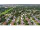 An elevated view showcasing the home's location in a well-maintained community at 1632 Ridge Top Way, Clearwater, FL 33765