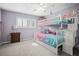 Charming bedroom featuring a bunk bed and soft, calming colors at 1632 Ridge Top Way, Clearwater, FL 33765