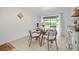 Inviting dining area with views of the backyard pool at 1632 Ridge Top Way, Clearwater, FL 33765
