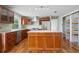 Elegant kitchen with stainless steel appliances, granite countertops, and wood cabinetry at 17 Freshwater Dr, Palm Harbor, FL 34684