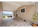 Inviting covered patio with beautiful brick pavers and views of the lake at 17 Freshwater Dr, Palm Harbor, FL 34684