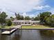 Beautiful waterfront property featuring a private dock and a spacious backyard at 17 Freshwater Dr, Palm Harbor, FL 34684