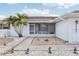 This cozy home features a screened-in porch, perfect for enjoying outdoor living with comfort and shade at 1732 Flamingo Ln, Sun City Center, FL 33573