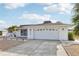 This home has a well-maintained front yard, a screened porch, and an attached two-car garage at 1732 Flamingo Ln, Sun City Center, FL 33573