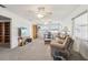 Spacious living room with large windows providing ample natural light at 1732 Flamingo Ln, Sun City Center, FL 33573