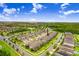Scenic aerial view of townhome and surrounding neighborhood, highlighting community amenities at 17378 Cruiser Bnd, Land O Lakes, FL 34638