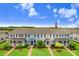 An aerial view showcasing the townhome's location within a community setting and manicured landscaping at 17378 Cruiser Bnd, Land O Lakes, FL 34638
