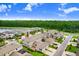 Aerial view showing the home's location within a well-maintained neighborhood with lake views at 17378 Cruiser Bnd, Land O Lakes, FL 34638