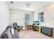 Comfortable living space with neutral palette, a ceiling fan, and bright natural light at 17378 Cruiser Bnd, Land O Lakes, FL 34638