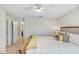 Bright main bedroom with a plush bed, comfortable linens, and an inviting atmosphere at 17378 Cruiser Bnd, Land O Lakes, FL 34638
