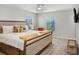 Relaxing main bedroom with a comfortable bed, soft linens, and a warm, inviting feel at 17378 Cruiser Bnd, Land O Lakes, FL 34638